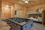 Lower level game area/twin size bunks